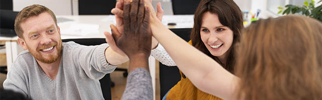 EUROCAD team members high-fiving after a successful coordinated engagement